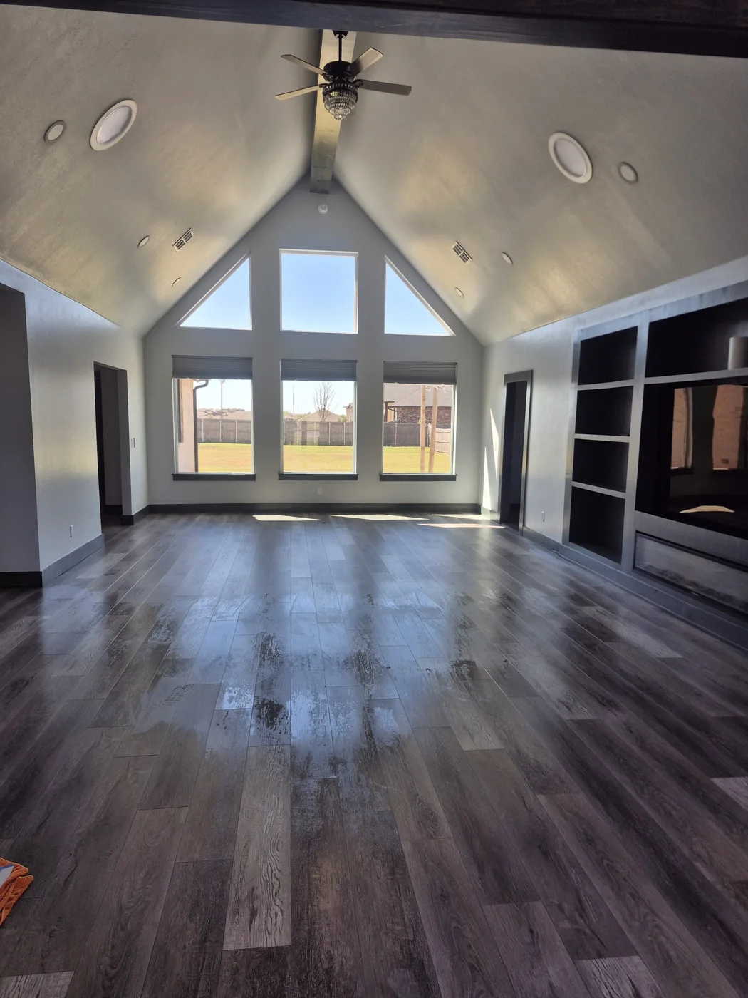 Bright vaulted living room after a house cleaning