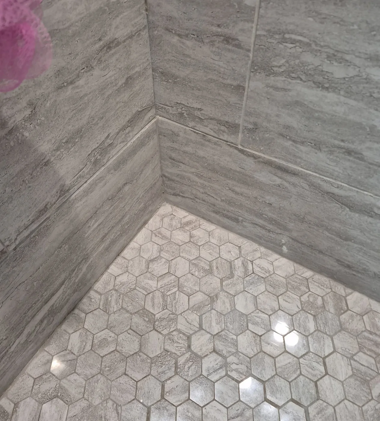 Tiled shower corner after cleaning